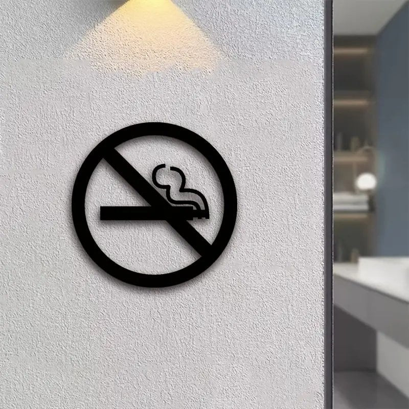 Cartel con señal de no fumar